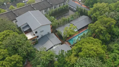 Wuxi Village Banzhuyuan Homestay (Lingshan Giant Buddha Nianhuawan Branch) Отели в г. Уси