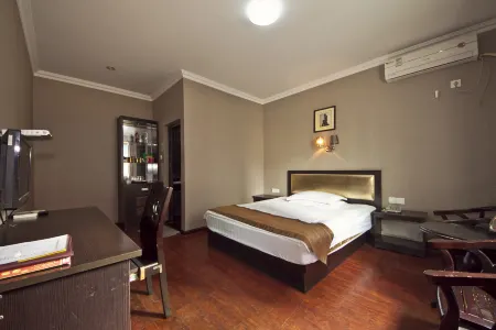 Meixin Business Hotel Отели рядом с достопримечательностью «Yongchun Tulou»