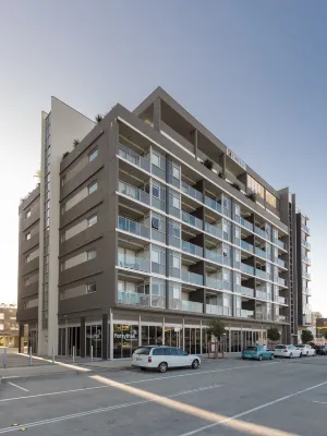 Honeysuckle Executive Apartments Отели в г. Ньюкасл