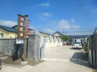 Panjin Liujun Farmhouse โรงแรมใกล้ทางเดินชมวิวแห่งชาติหาดแดง