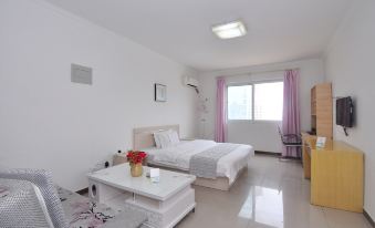 Yaju hotel apartment (Zhengzhou Erqi Mixc store)