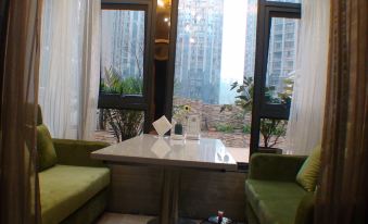 Qu County Garden Business Hotel (Fortune Center Store)