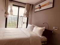 广州花序艺术酒店式公寓 - 吟风观山景复式大床房