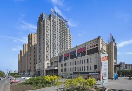 Huaqiang Novlion Hotel Отели рядом с достопримечательностью «Shenyang Institute of Engineering»