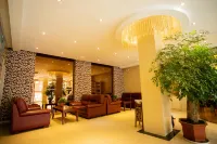 Xinyang Xingang Business Hotel - 2 Yıldız