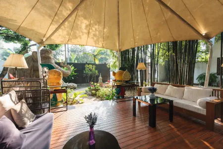 Mango T. Villa Chiang Mai Resort Отели рядом с достопримечательностью «Wat Don Chan»