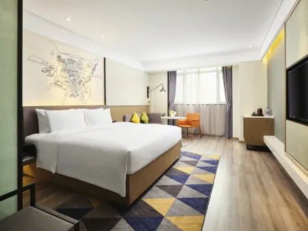 Wanda Moments Hotel Отели рядом с достопримечательностью «Heze University North Campus»