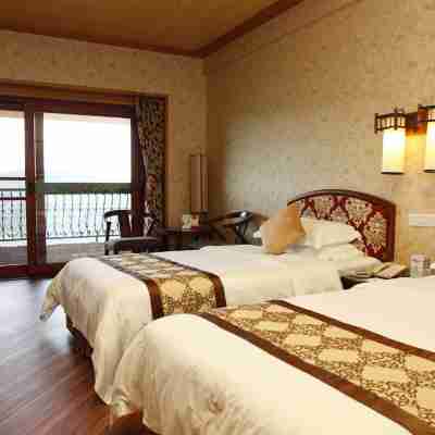 梅州雁南飛圍龍大酒店 Rooms