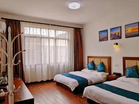 Guilin Guzhen Inn (Dawei Guzhen Inn) Отели рядом с достопримечательностью «Li River Craftsman Village»