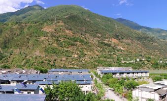 Asbestos Xiangfengju Inn