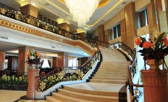 The lobby or reception area at Hotel Grand Kandyan Plaza in Shanghai Hong is being reviewed for grammatical accuracy, clarity, fluency, coherence, and the elimination of superfluous information at Jinghu Hotel