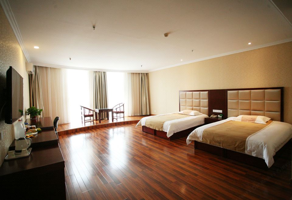 Zhengrong Business Hotel (Xinzhou Kailai Xinyue Shopping Plaza) - Housity