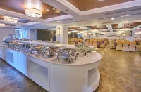 Fujian Minyuan Hotel (Minhou University Town Minjiang University Academic Exchange Center) - servizio colazione
