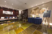 Western Evergreen Pu Zhen Hotel