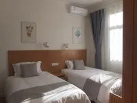 Xichang Qiyue Haizhu Homestay - บริการรถรับส่ง