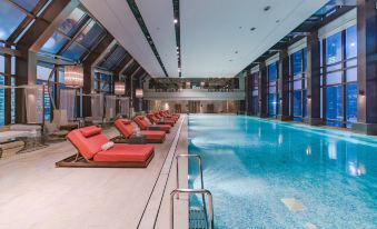 The hotel's indoor pool is a must-visit spot for enjoying breakfast during the afternoon and evening at IFC Residence