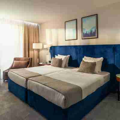 Astor Garden Hotel Rooms