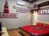 Yi Ni A Ge Inn فنادق في تشيوبَي