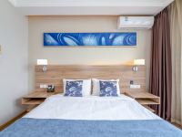 扬州斯维登度假公寓(彩虹汇瘦西湖) - 蔚蓝和风大床房