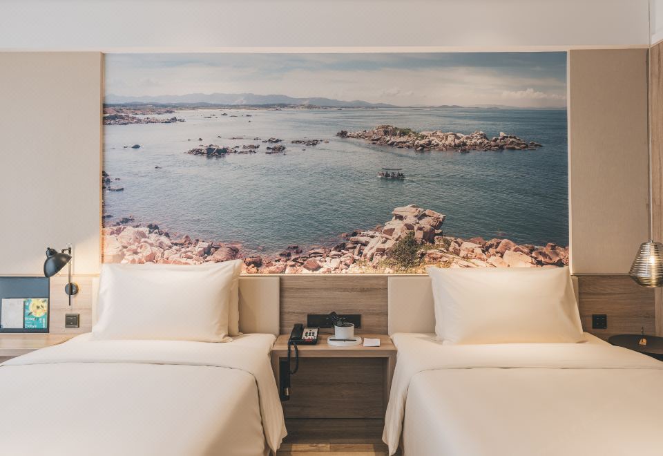 푸닝 고속철도역 아투어 호텔의 침실