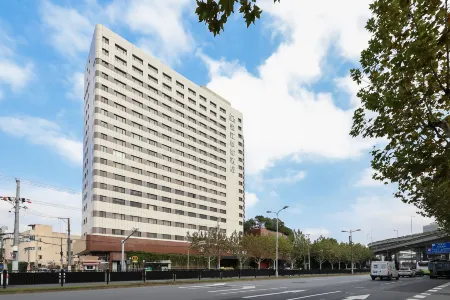 Jinjiang Metropolo Hua Ting Guest House Отели рядом с достопримечательностью «Longhua Temple»