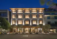 Manqigu Hotel - Inns
