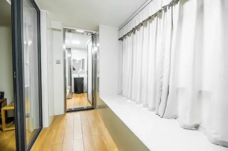 Binhai Holiday Apartment Отели рядом с достопримечательностью «Techeng Island»