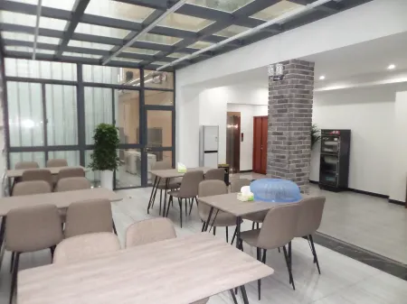 Shangpin Business Hotel Отели рядом с достопримечательностью «Taiji Wuse Valley»