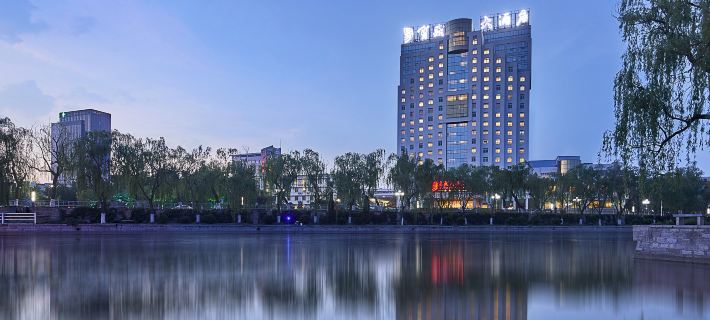 Blossom Hotel Отели в г. Фейченг