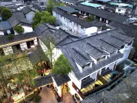 Qingcheng Mountain Street ancient town Joy Hotel. Time Flowers. Scenic Center Pedestrian Street Shop Отели рядом с достопримечательностью «Пассажирская остановка улицы»