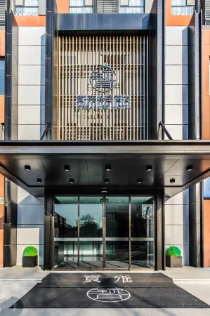 Qingdao Baodi Fengyue Hotel (Olympic Sculpture Cultural Park shop) Отели рядом со станцией Chengyang Railway Station