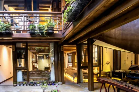 Tongzi Huakai Homestay Отели рядом со станцией Langzhong Railway Station