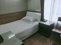 上海九宇旅店 - 大床房