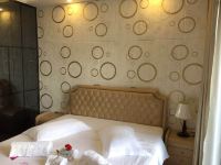 惠州大亚湾世纪阿文酒店公寓 - 主题大床房