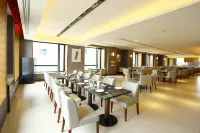 Xinchang Wozhou Junyi Hotel - servizio colazione