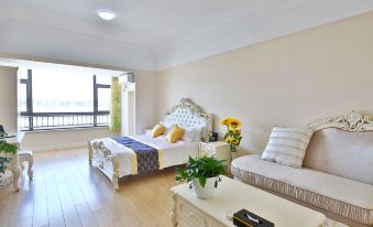 Sweetome Vacation Apartment (Qingdao Wanda Oriental Cinema)