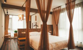 Wuyuan Fangzi Tea Homestay (Wuyuan High-speed Railway Station Xiangao Ancient City Branch)