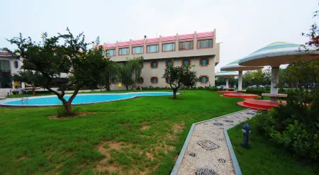 Taoranju Hotel Отели рядом с достопримечательностью «Linyi University No.2 Experimental Teaching Area»