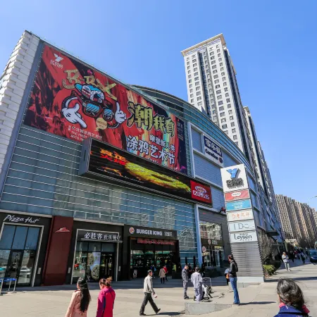 Dalian Yihe Zhixing Holiday Apartment Отели рядом с достопримечательностью «Железнодорожный вокзал Далянь-Северный»