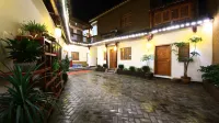 Puzhehei Asi Mide Inn Hotels near Fairy Cave