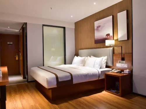 Jtour Inn Hotel (Chongyang Taoxi Avenue) - فطور