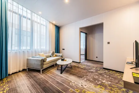 Bo'erte Business Hotel Отели рядом с достопримечательностью «Jiangjun Mountain»