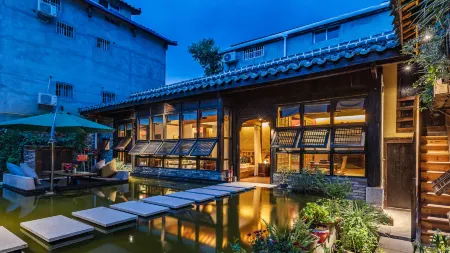 Floral Hotel · Zhanlin's House Guangyuan hotel Отели рядом с достопримечательностью «Zhaohua Ancient City»