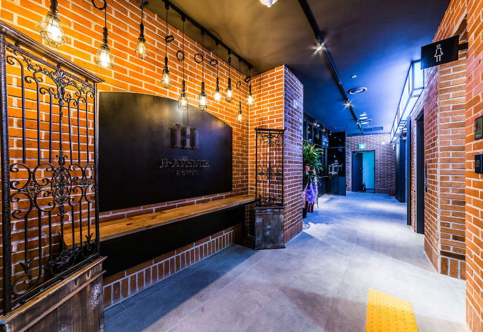 에이치에비뉴호텔 객실 또는 바 전경