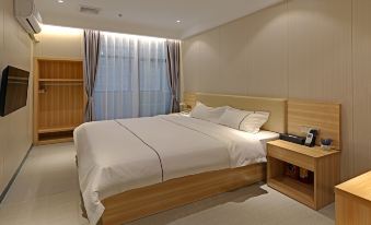 Xingyi Chain Hotel Jiangxia Metro Station