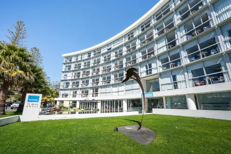 Scenic Hotel Te Pania Отели в г. Нейпир