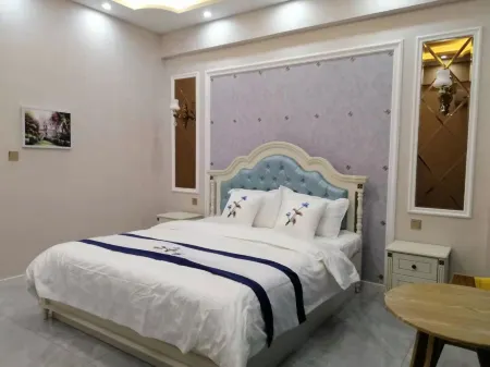 Daqing Shangjing Apartment Отели рядом с достопримечательностью «Ironman Square»