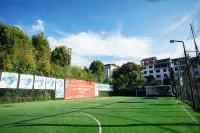 Xingren International Hotel - parking