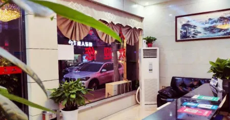 Taojiang Qijia Business Hotel