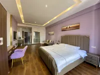 Chenzhou Zhongyi Apartment Hotel - Condos